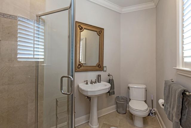 a kitchen with cabinets a sink and appliances