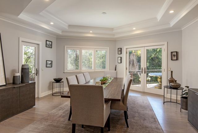 a bedroom with a bed and lamps