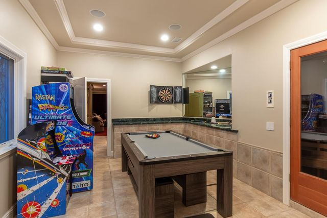 a view of a swimming pool with chairs