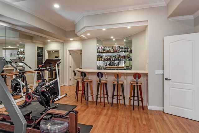 a view of a lush green hillside and a building