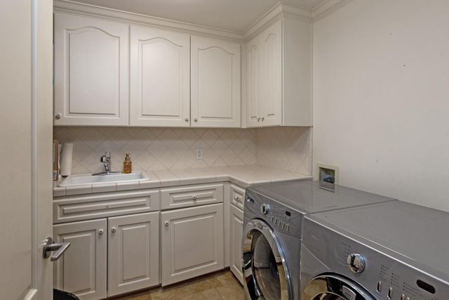 a view of living room and kitchen