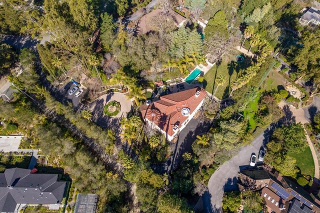 a house view with a sitting space and garden view