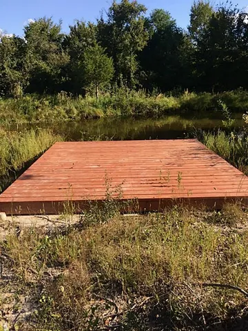 a view of a lake from a yard