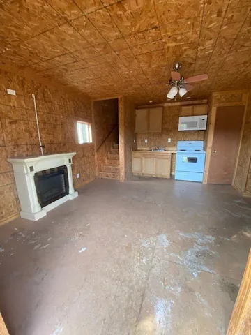 a view of a porch with wooden floor