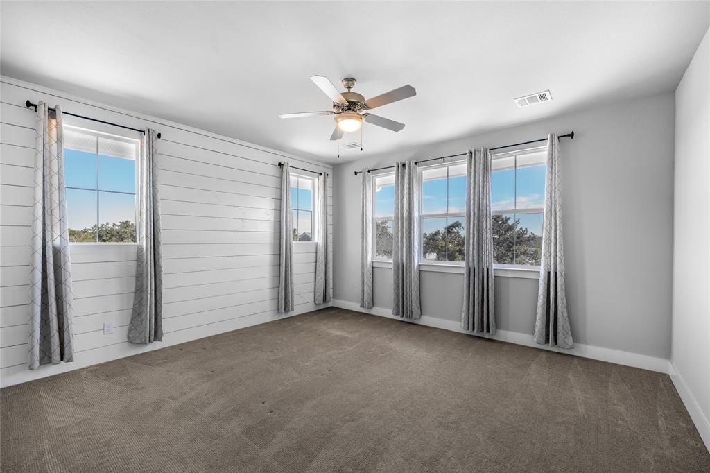 7807 Ryans Way Austin, TX 78726 - Photo 6 of 16 a view of an empty room with a window