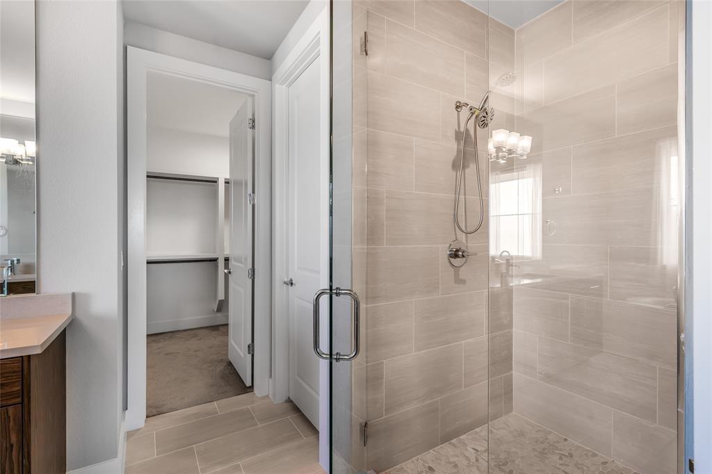 7807 Ryans Way Austin, TX 78726 - Photo 7 of 16 a bathroom with a shower and a sink