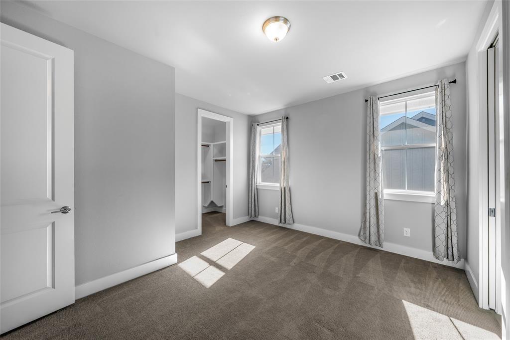 7807 Ryans Way Austin, TX 78726 - Photo 10 of 16 an empty room with windows