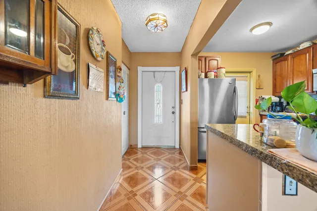 a bathroom with a sink a mirror and a shower