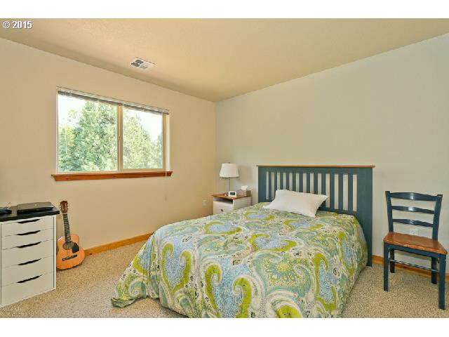 62 Rancho Del Oro Road Stevenson, WA 98648 - Photo 14 of 15 a bedroom with a bed and a closet