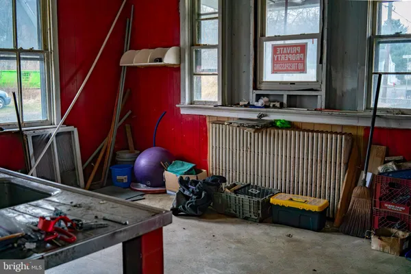 a bathroom with a toilet and a sink