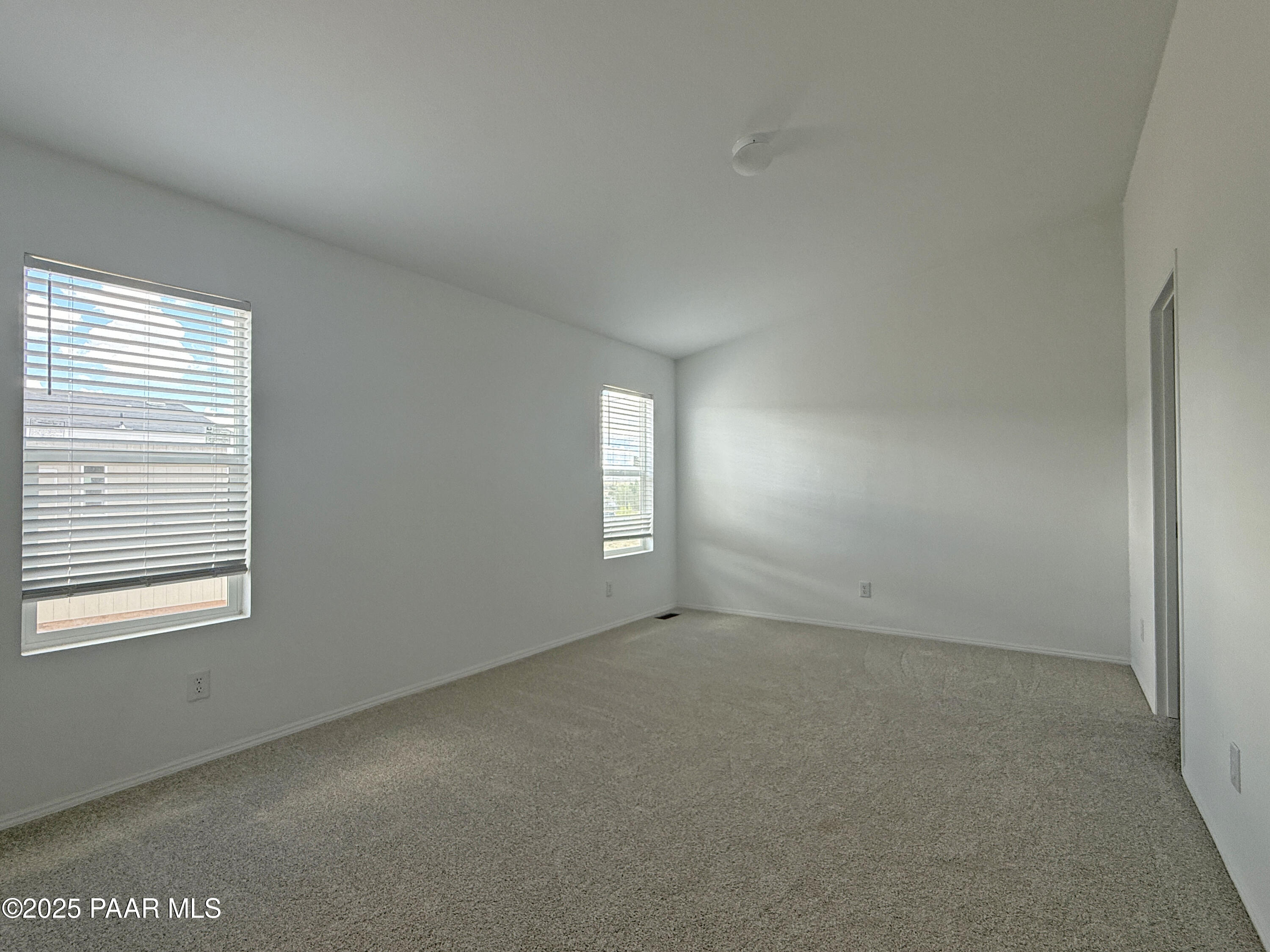 367 Antelope Run Road Paulden, AZ 86334 - Photo 8 of 17 an empty room with windows