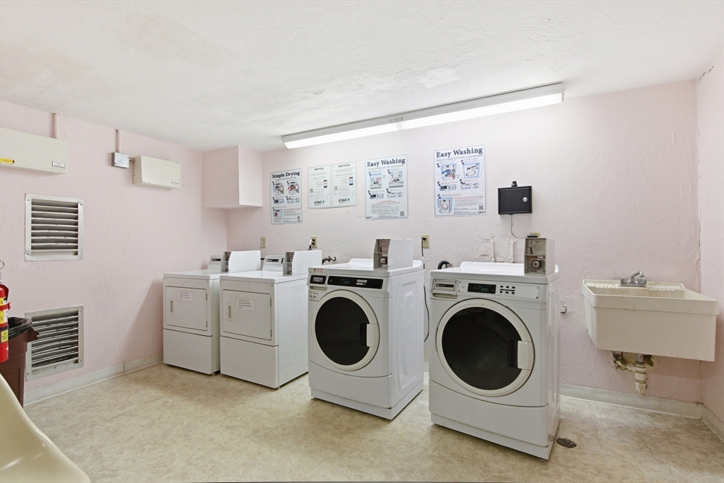 356 Neponset Street, Unit E Canton, MA 02021 - Photo 13 of 22 a utility room with dryer and washer