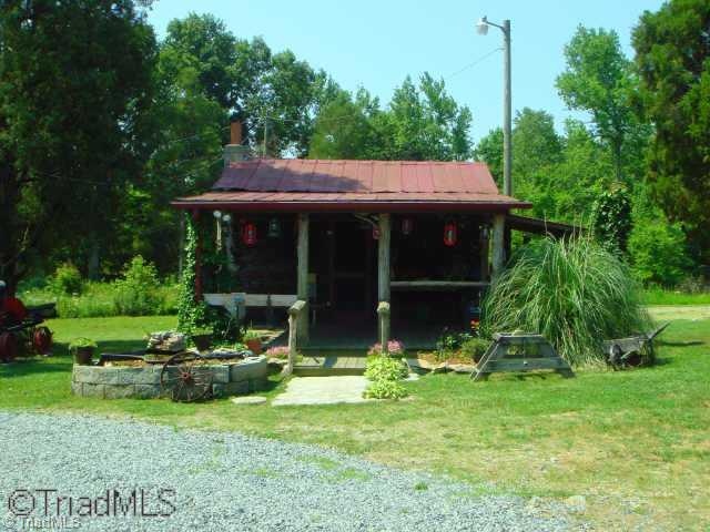 792 New Cut Road Lexington, NC 27292 - Photo 8 of 9 Other. Antique Log Cabin with woodstove and loft (also wired w/ cable and A/C)