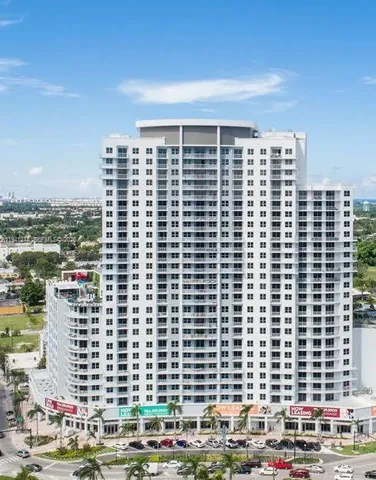 a view of city with tall buildings