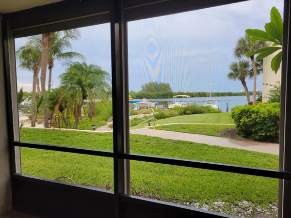 a view of a lake with a building in the background