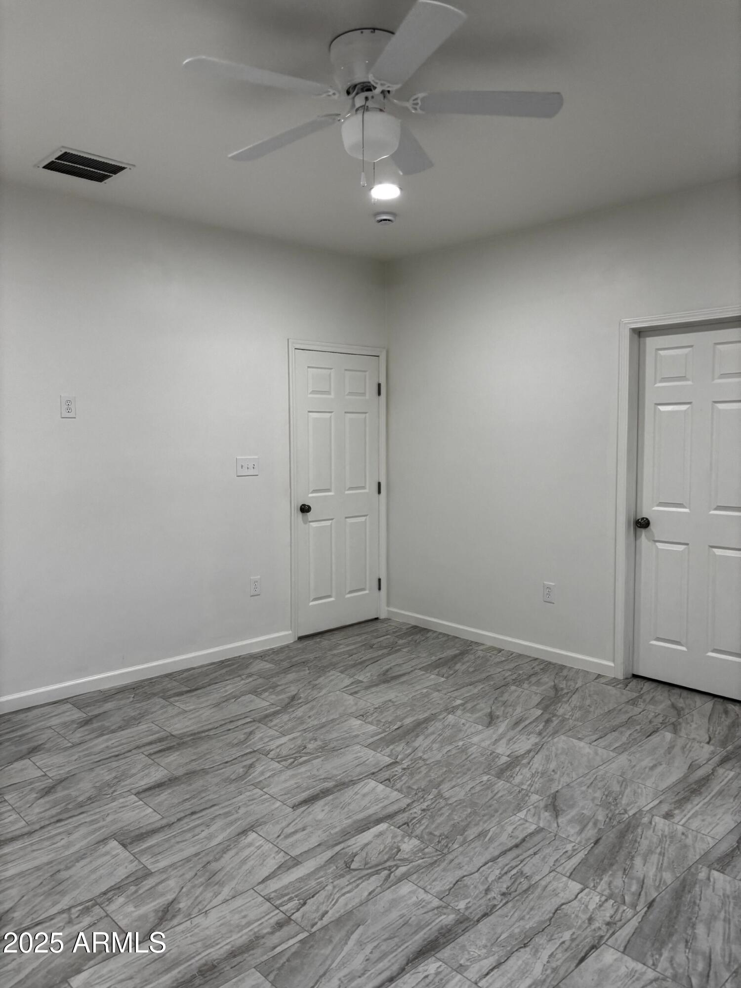 486 Anderson Avenue Douglas, AZ 85607 - Photo 12 of 16 wooden floor in an empty room