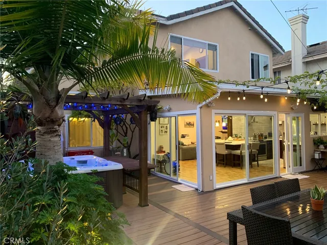 a view of a chairs and table in the patio