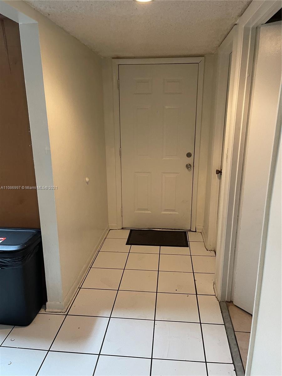 20681 Northeast 4th Place, Unit 101 Miami, FL 33179 - Photo 5 of 5 a view of an empty walk in closet