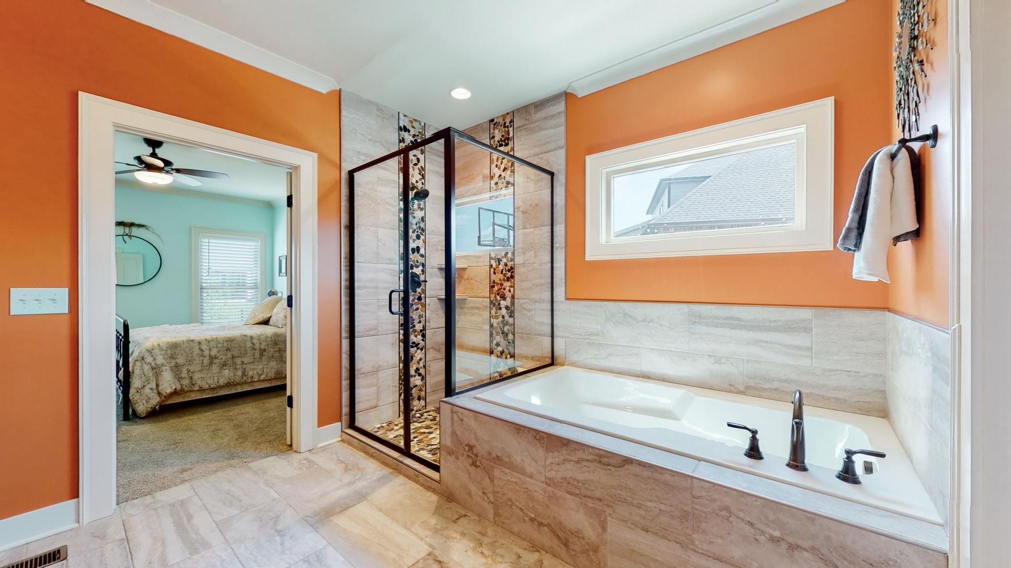 4017 Merryman Lane Murfreesboro, TN 37127 - Photo 27 of 62 a en suite bathroom with a tub shower and mirror