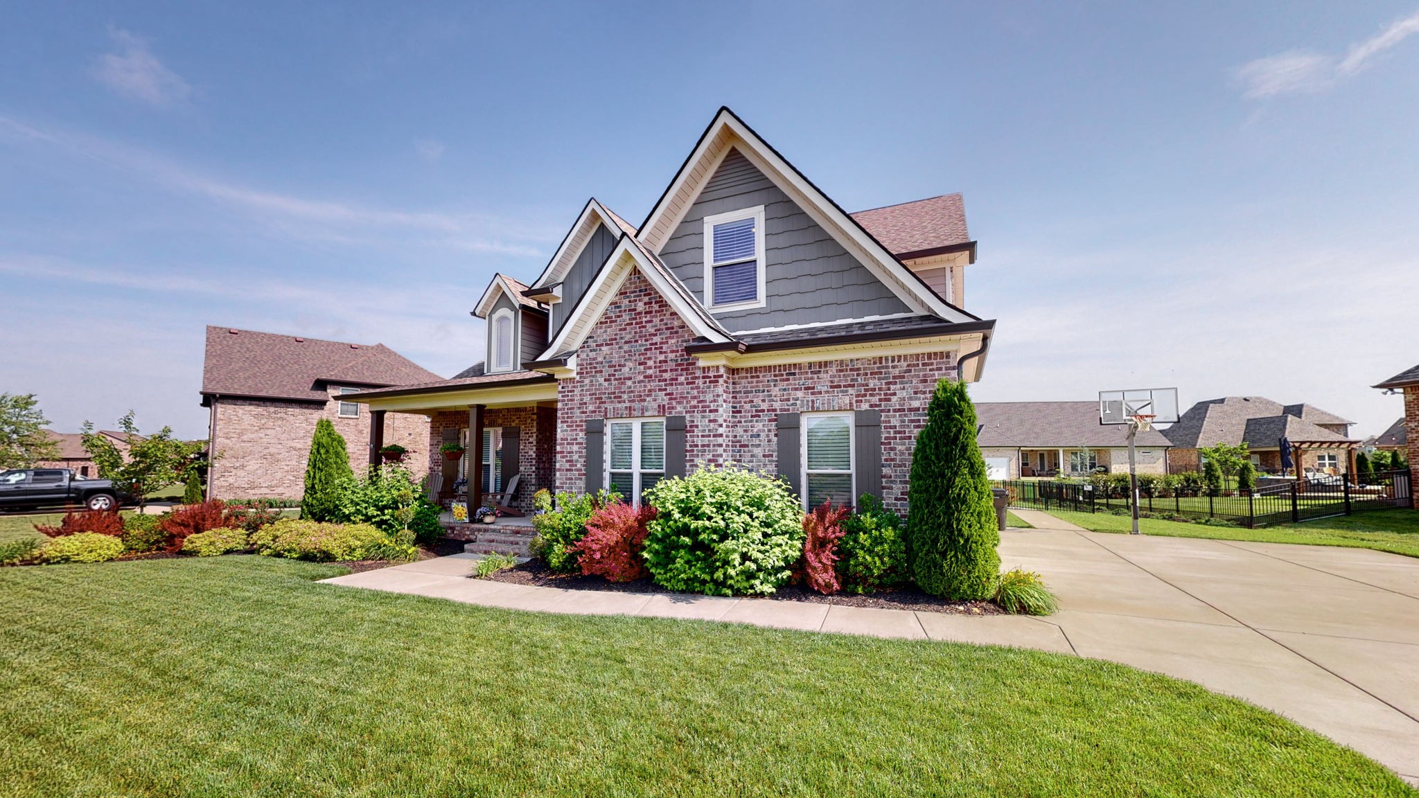4017 Merryman Lane Murfreesboro, TN 37127 - Photo 3 of 62 a front view of a house with a yard and trees