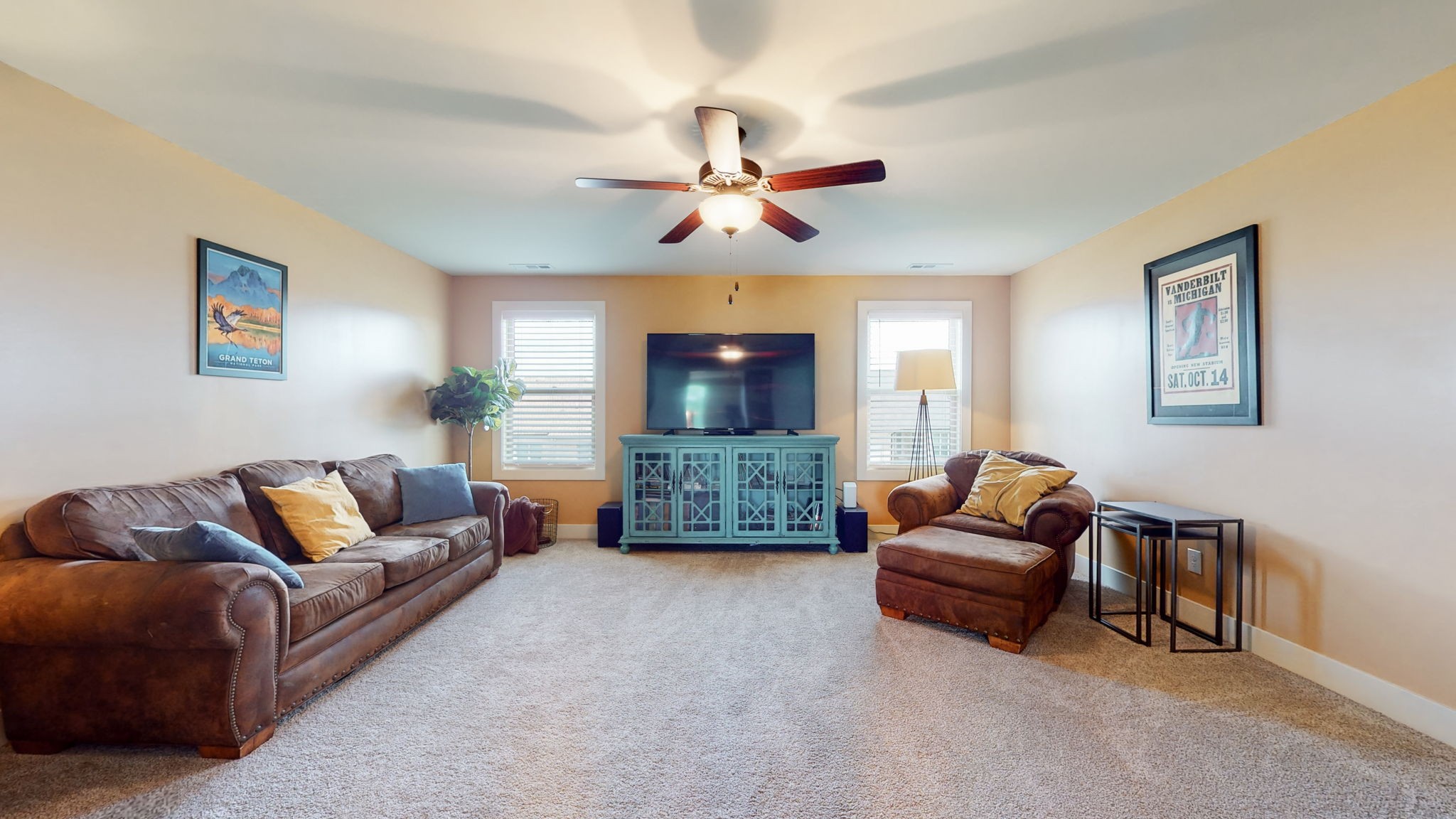 4017 Merryman Lane Murfreesboro, TN 37127 - Photo 31 of 62 a living room with furniture and a flat screen tv