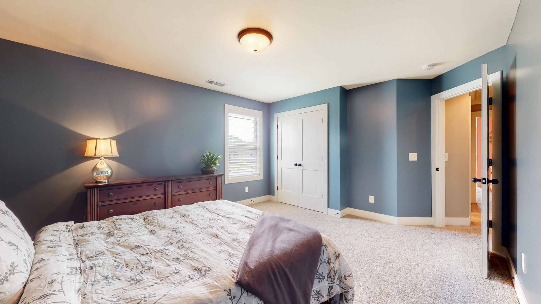 4017 Merryman Lane Murfreesboro, TN 37127 - Photo 37 of 62 a bedroom with a bed and a lamp on dresser