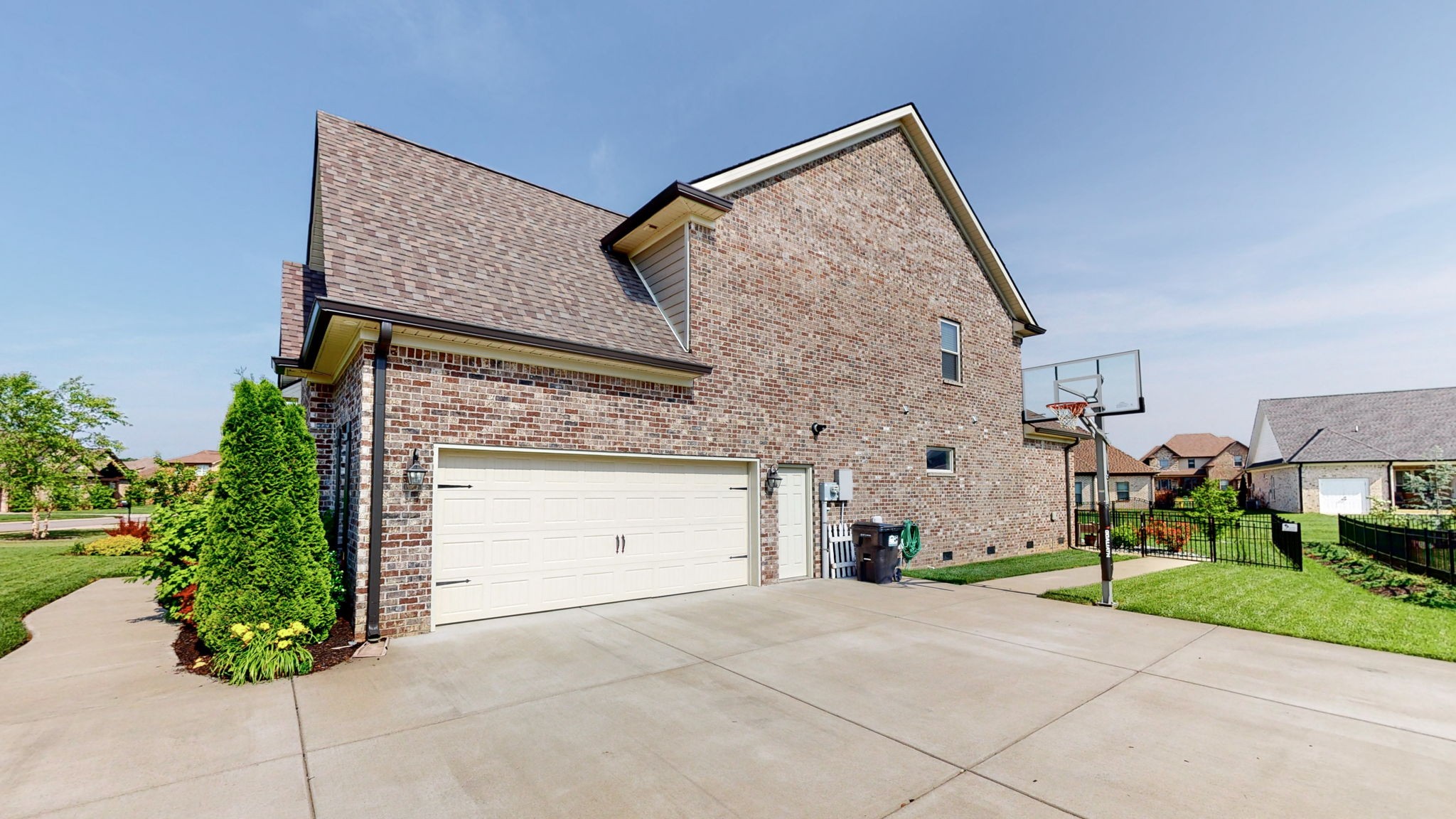 4017 Merryman Lane Murfreesboro, TN 37127 - Photo 49 of 62 a front view of a house with a yard and garage