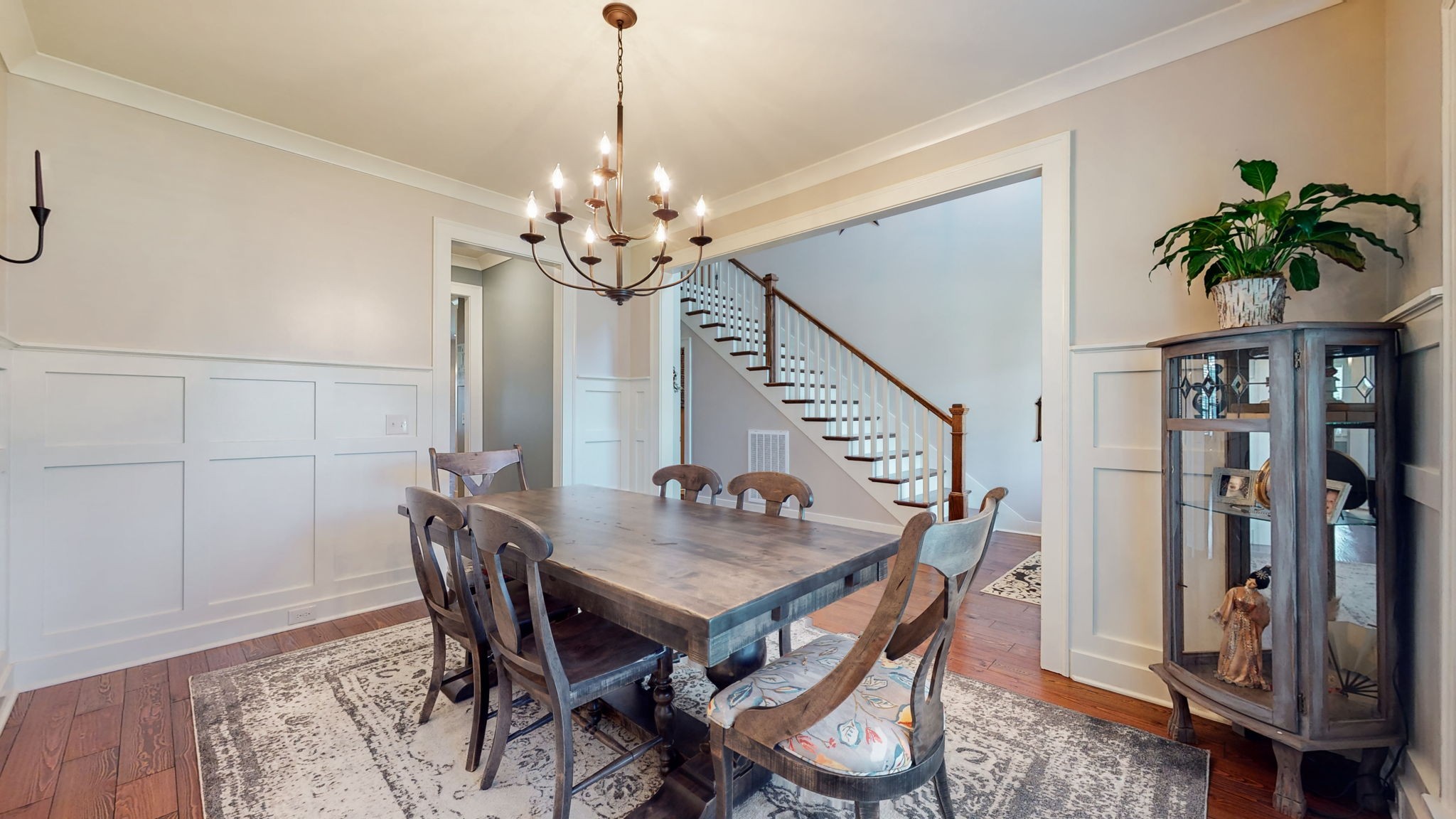 4017 Merryman Lane Murfreesboro, TN 37127 - Photo 9 of 62 a view of a dining room with furniture and a chandelier