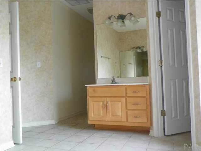 10066 Rookery Road Pensacola, FL 32507 - Photo 11 of 24 One of two vanities in the master bathroom