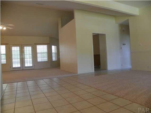 10066 Rookery Road Pensacola, FL 32507 - Photo 3 of 24 View from front door looking into great room, dining room and kitchen, office/formal living room to the left
