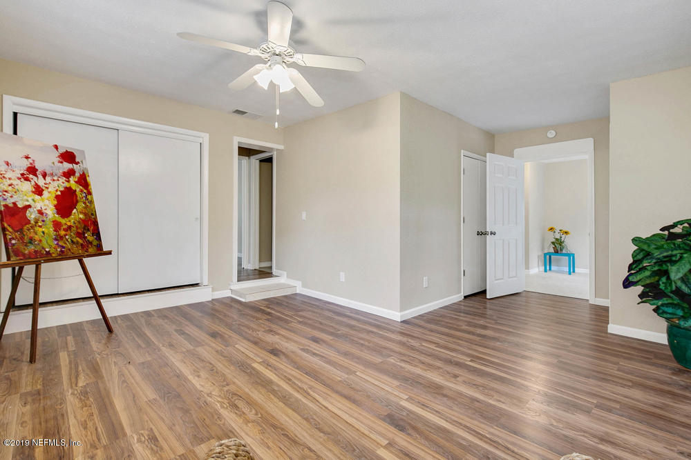 1175 Nightingale Road Jacksonville, FL 32216 - Photo 18 of 35 a view of an entryway with wooden floor
