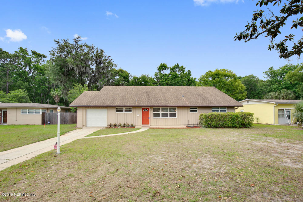 1175 Nightingale Road Jacksonville, FL 32216 - Photo 2 of 35 front view of a house with a yard