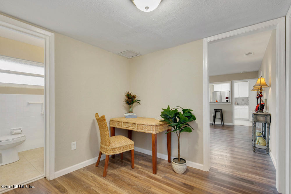 1175 Nightingale Road Jacksonville, FL 32216 - Photo 23 of 35 a living room with furniture and a potted plant