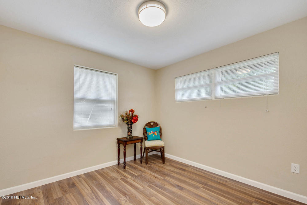 1175 Nightingale Road Jacksonville, FL 32216 - Photo 28 of 35 a view of room with window and wooden floor