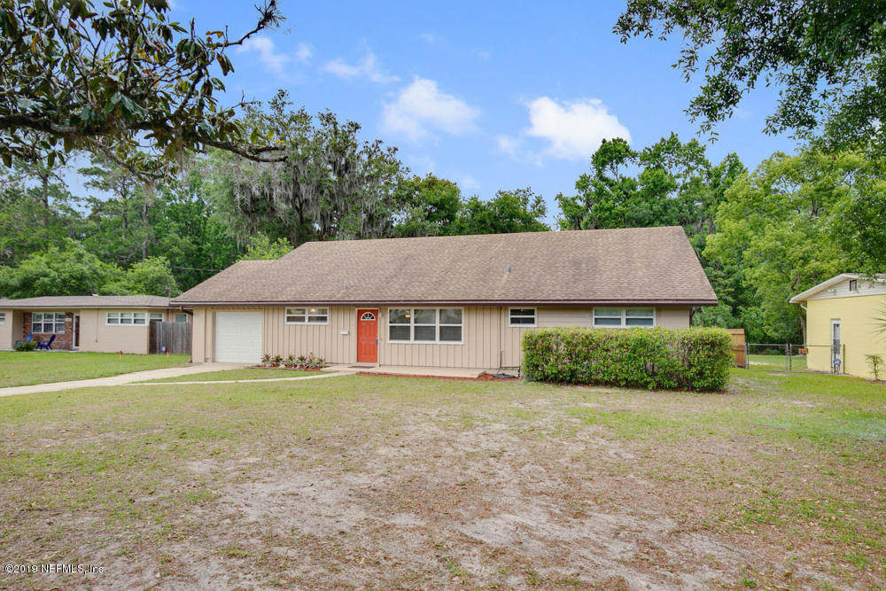 1175 Nightingale Road Jacksonville, FL 32216 - Photo 4 of 35 front view of a house with a yard