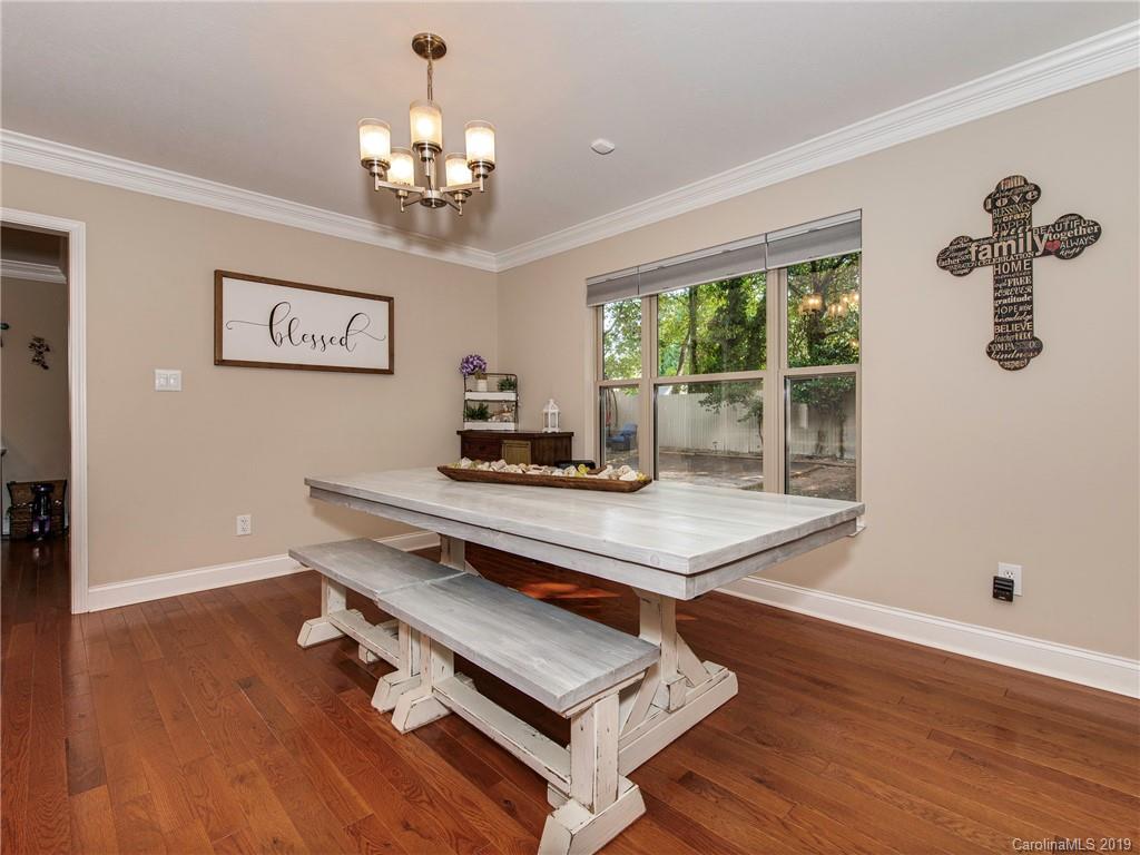 4109 Lake Shore Road South Denver, NC 28037 - Photo 14 of 31 a room with table chair and wooden floor