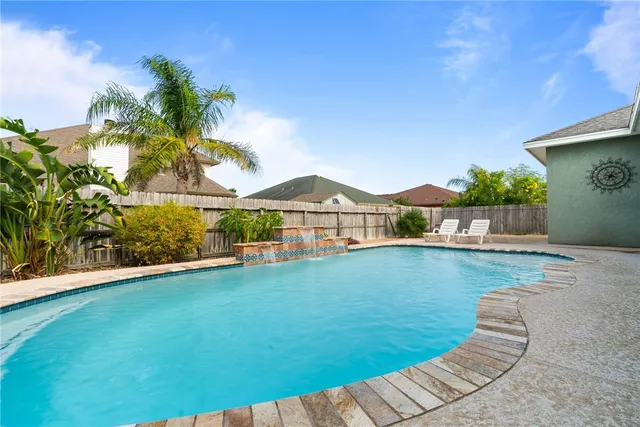 a view of a house with a swimming pool