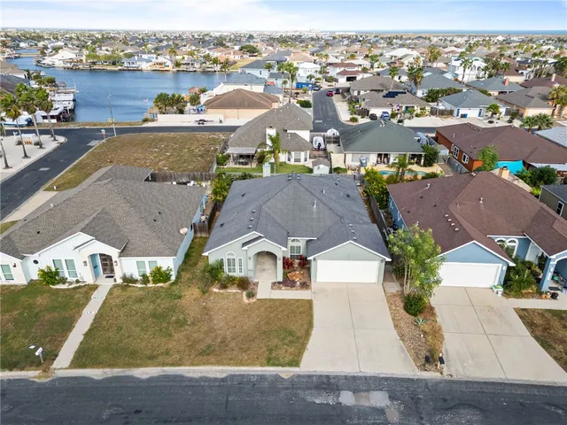 an aerial view of a city with lots of residential buildings