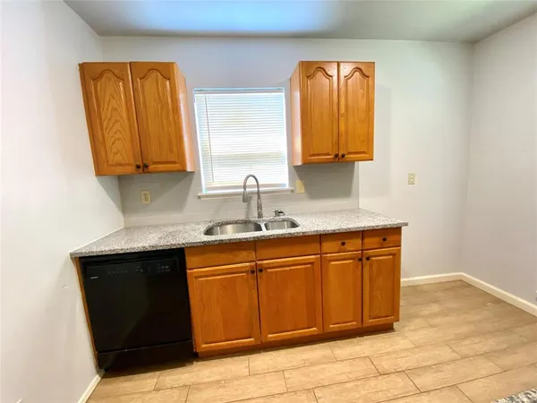 a bathroom with a sink vanity and mirror