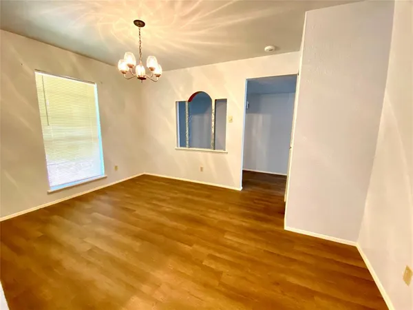 a view of livingroom with kitchen
