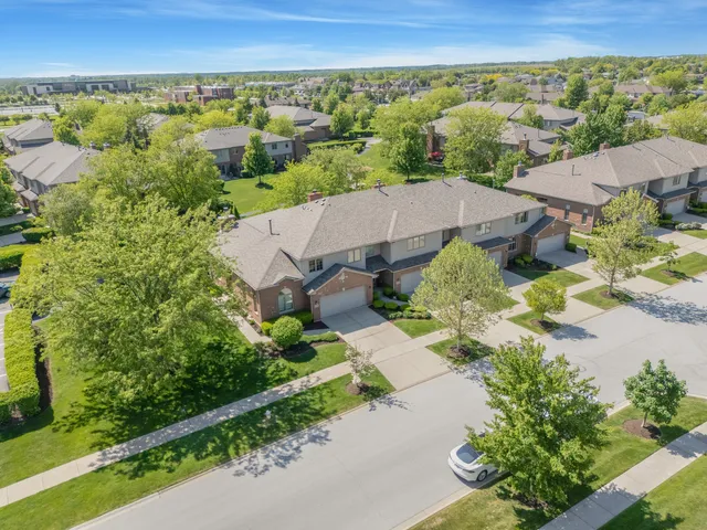 an aerial view of a house with a garden