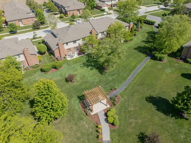 an aerial view of residential house with outdoor space