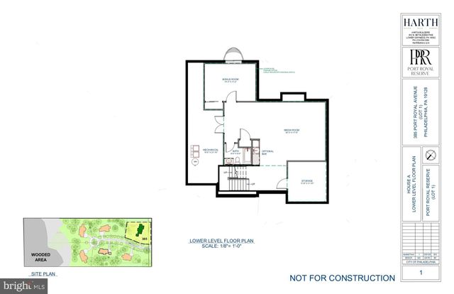 a white house that has a tree in front of it