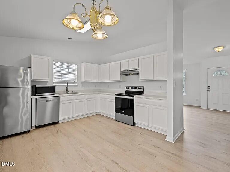 3676 Watkins Ridge Court Raleigh, NC 27616 - Photo 9 of 17 352d776bbcf1f370f1dc8591bd2c43ee-cc_ft_7