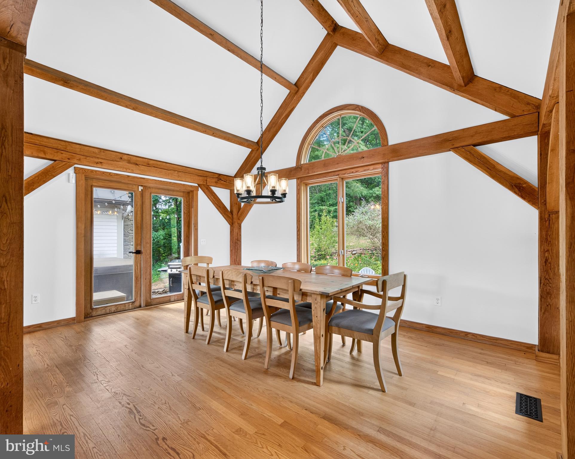 4028 South F T Valley Road Etlan, VA 22719 - Photo 53 of 101 a view of a dining room with furniture window and wooden floor