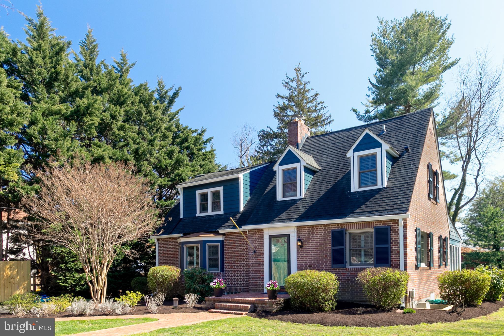 727 Whitehall Beach Road Annapolis, MD 21409 - Photo 1 of 44 a front view of a house with a yard