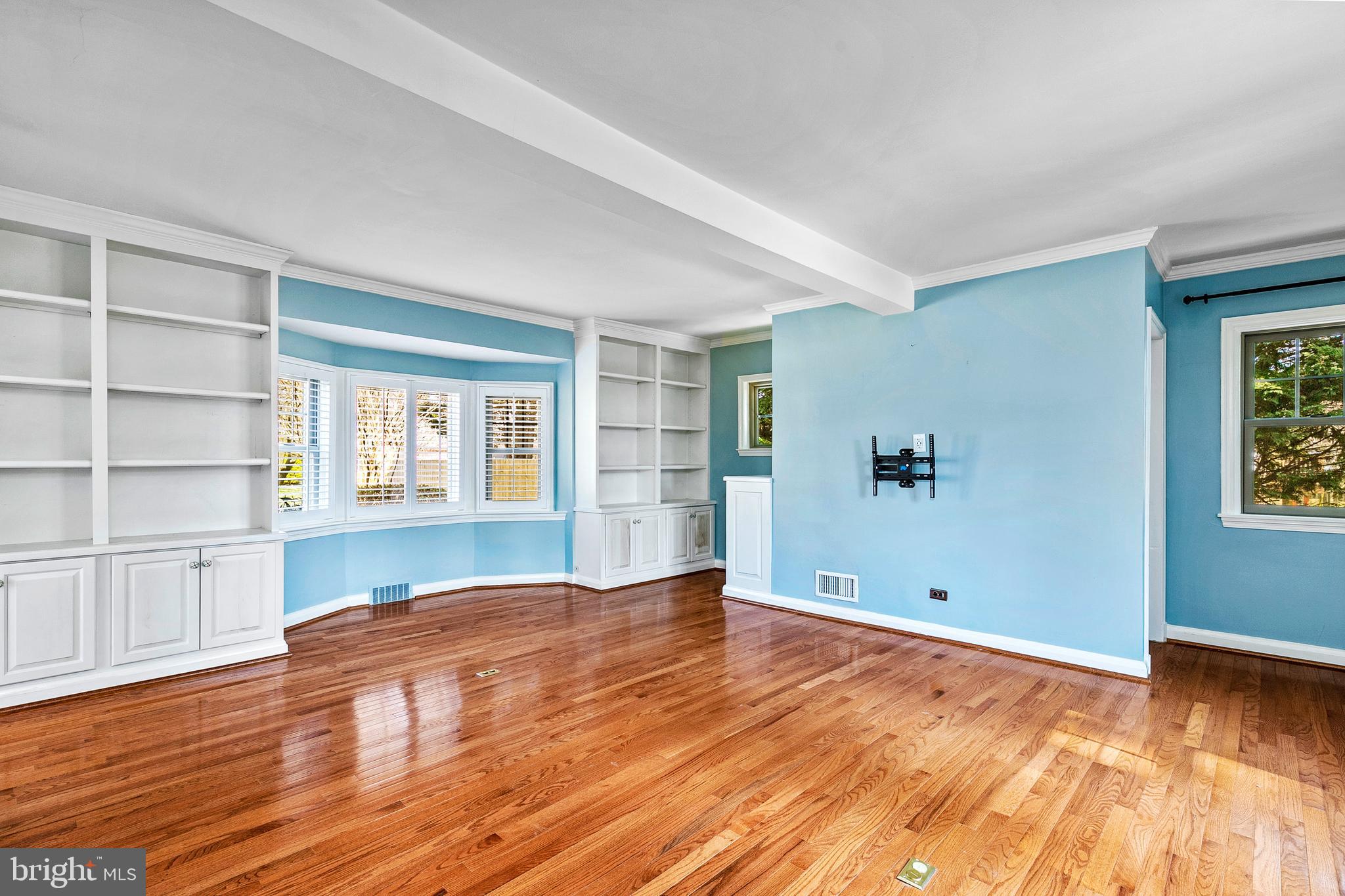 727 Whitehall Beach Road Annapolis, MD 21409 - Photo 18 of 44 a view of empty room with wooden floor and fan