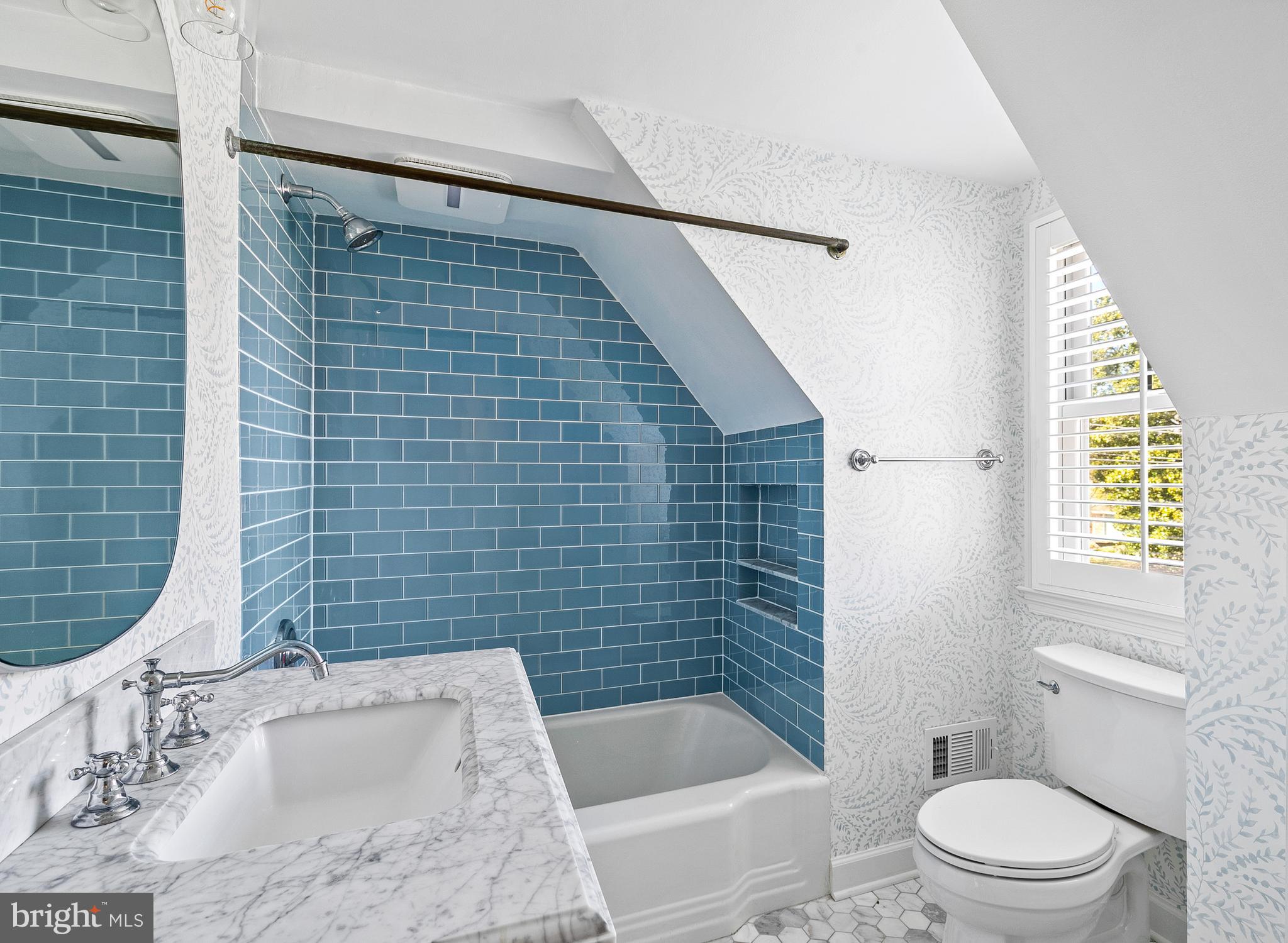 727 Whitehall Beach Road Annapolis, MD 21409 - Photo 26 of 44 a bathroom with a sink a toilet and shower