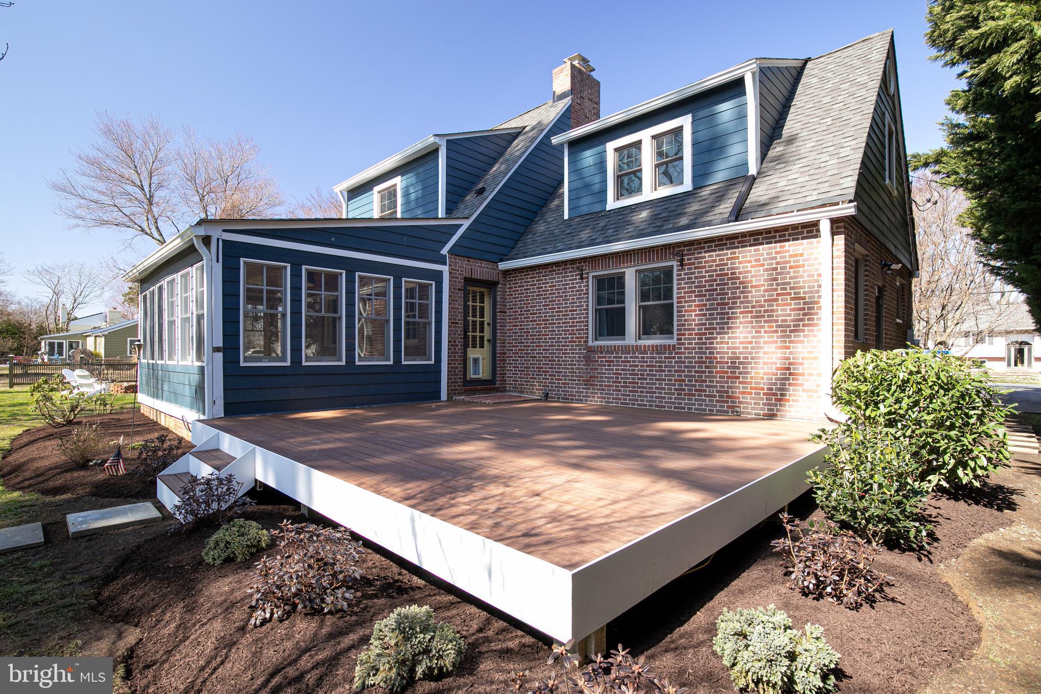 727 Whitehall Beach Road Annapolis, MD 21409 - Photo 29 of 44 a view of a house with wooden fence