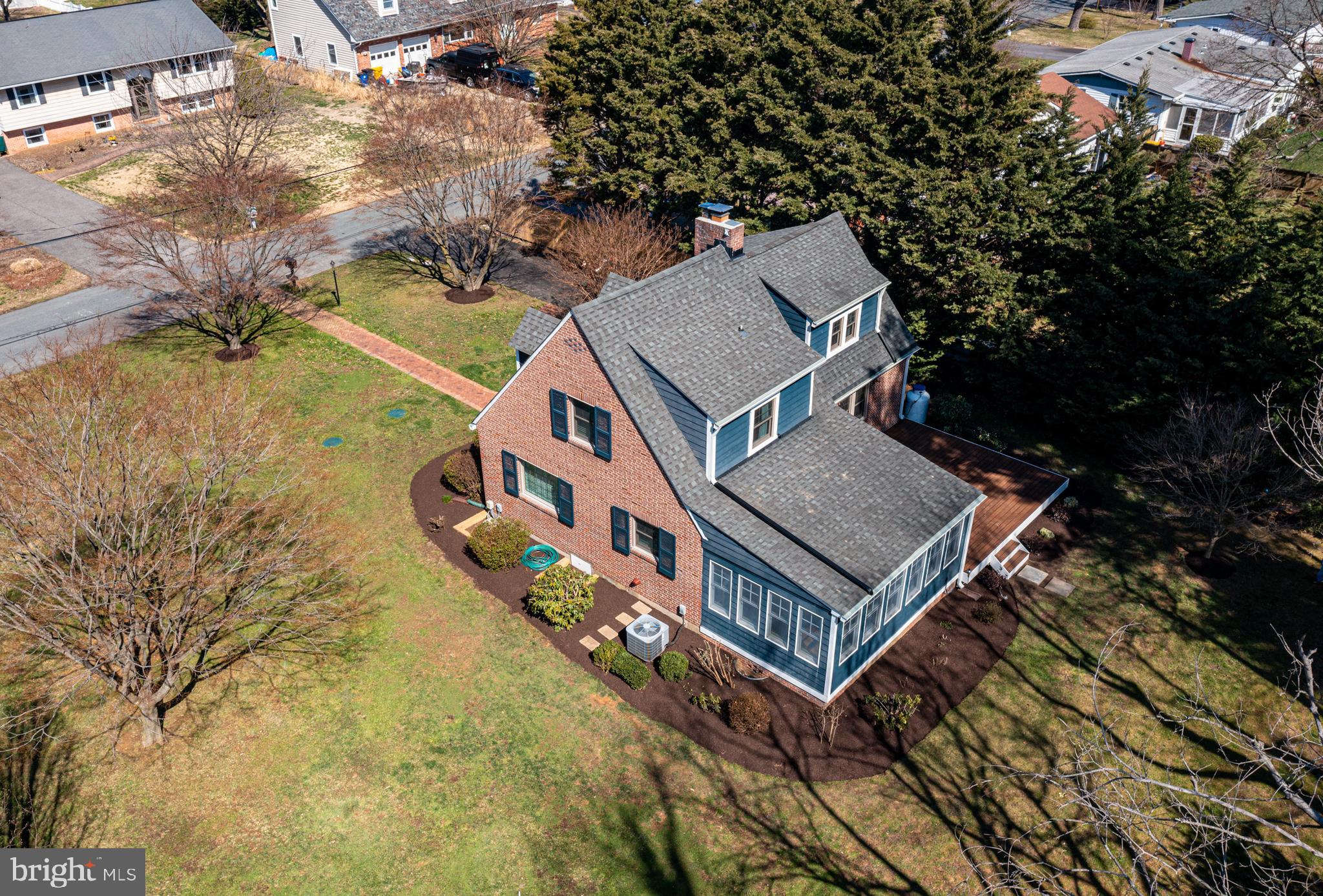 727 Whitehall Beach Road Annapolis, MD 21409 - Photo 3 of 44 an aerial view of a house with a yard